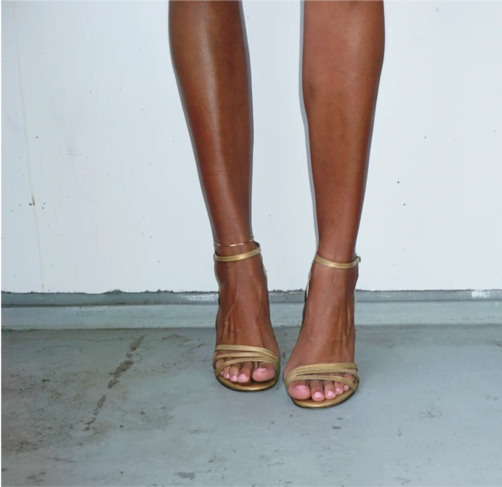 Miel heels worn with a skirt
