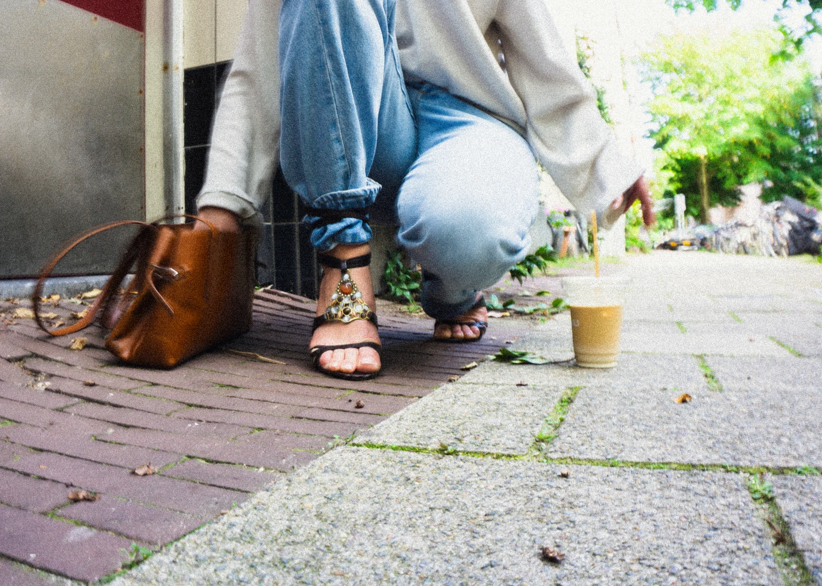 Close-up of mosaic heels with jeans